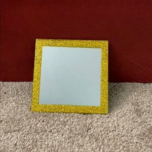Gold mirror
